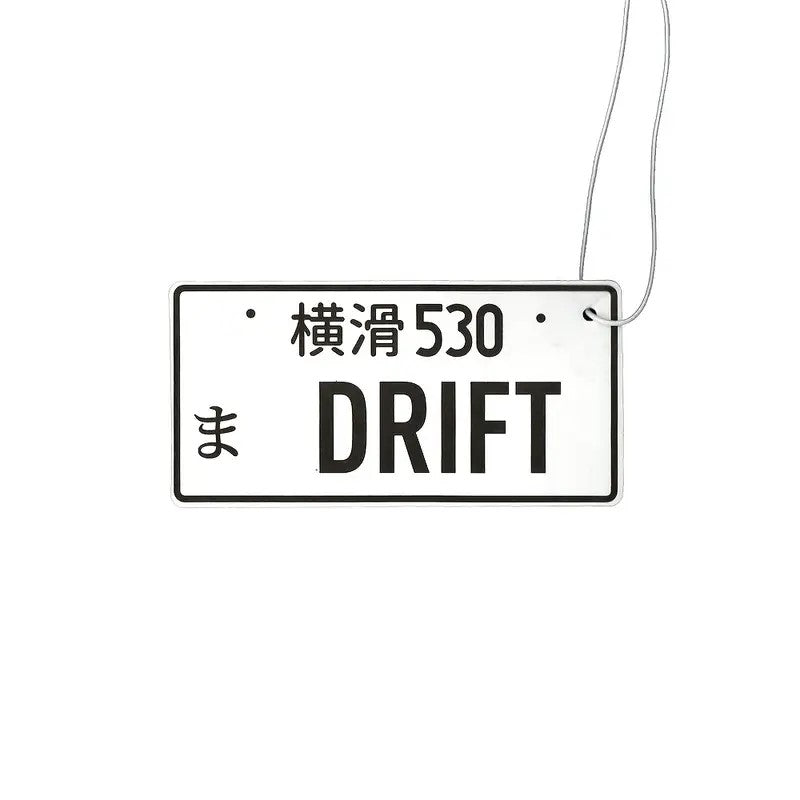 Air freshener license plate drift