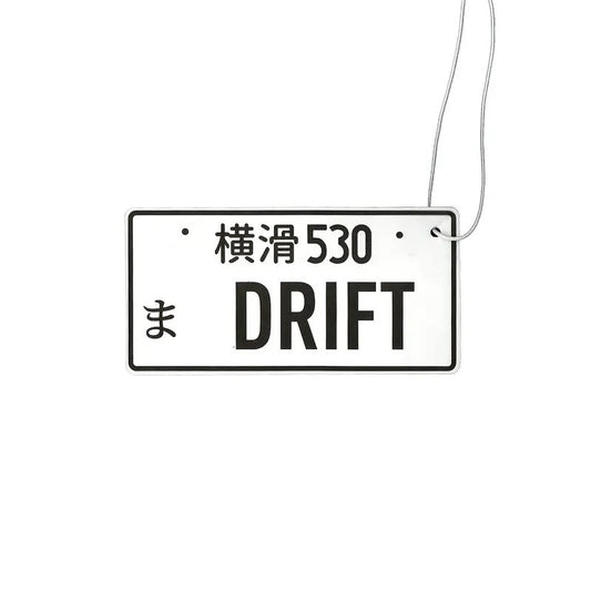 Air freshener license plate drift